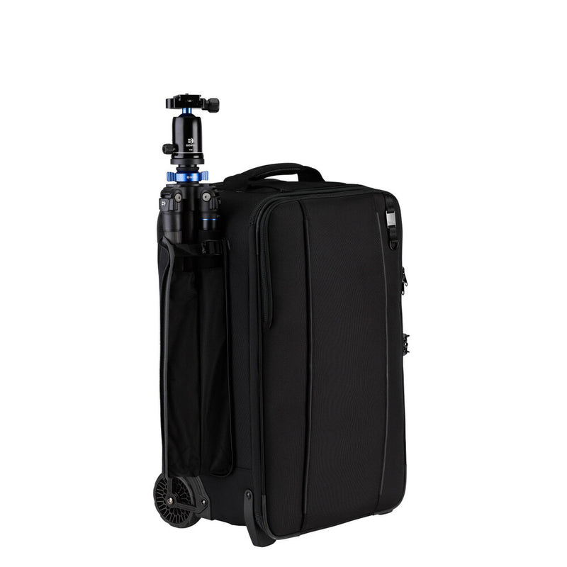 An image of the Tenba Roadie Roller 24 Black roll along case for storing cameras and photographic equipment. A side compartment is used to store a Benro tripod.