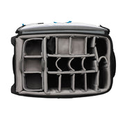 An image of the Tenba Roadie Roller 24 Black roll along case for storing cameras and photographic equipment. It is open showing a padded inset wih sections for holding cameras, lenses and other accessories.