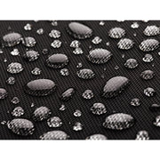 An image of the nylon fabric for the Tenba Roadie Roller 24 Black roll repelling droplets of water.
