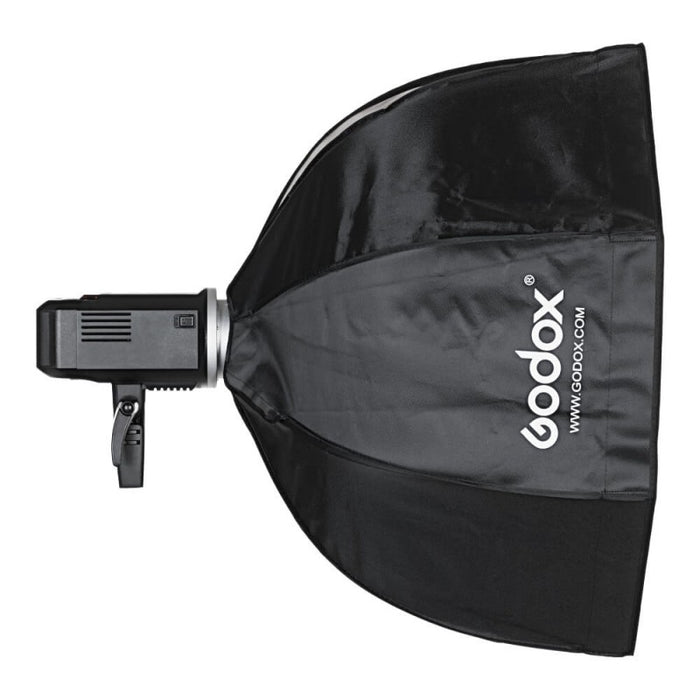 An image showing the Godox 95cm Foldable Octagonal Softbox from the side, mounted to a photographic light with a Bowens mounting ring.